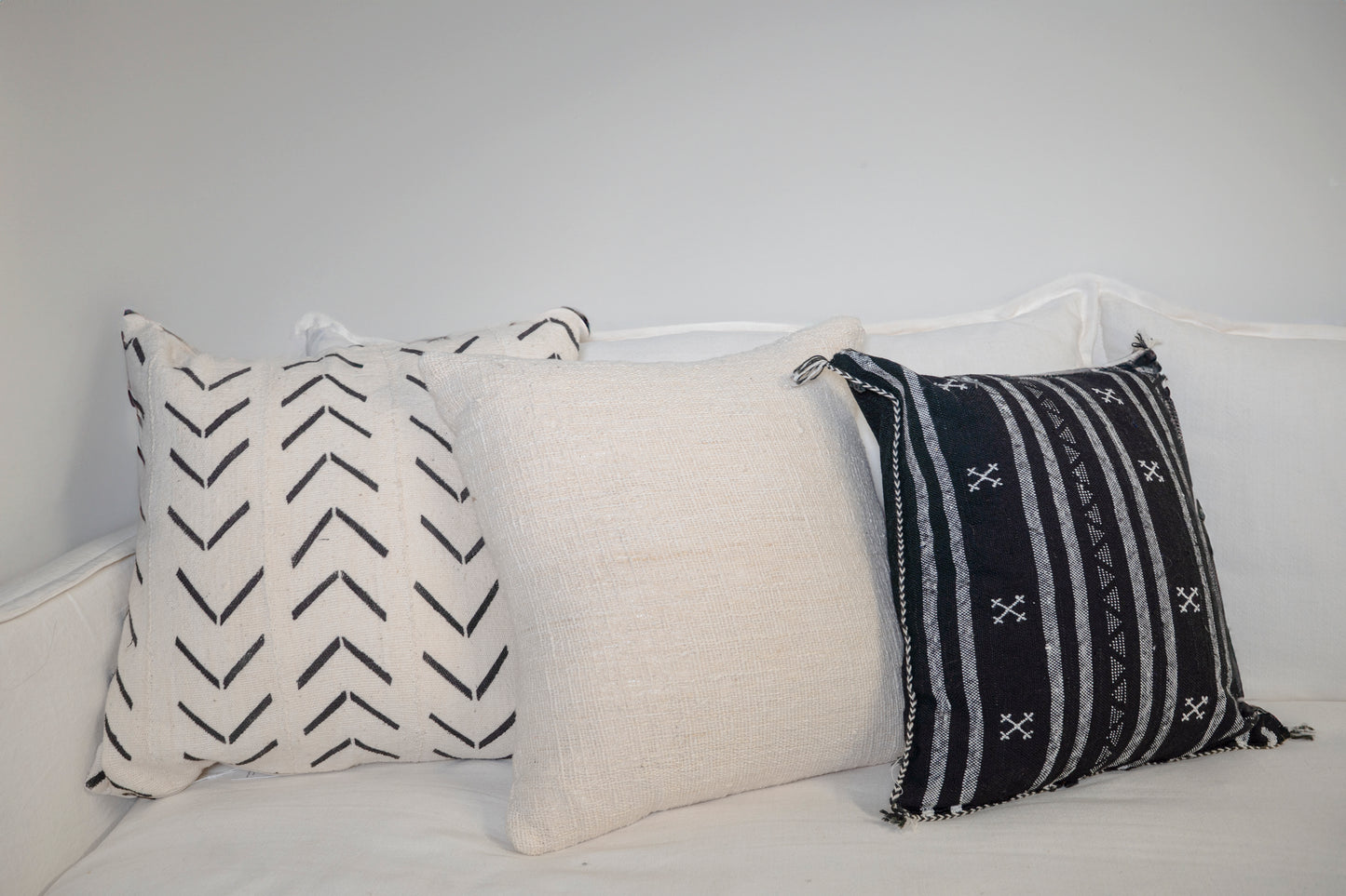 Black base and intricate white tribal-style patterns