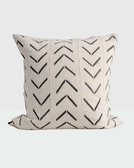 Cream-colored base and black chevron-style patterns